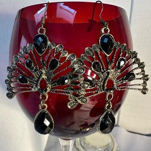 Intricate filigree style peacock earrings